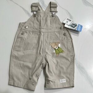 Carter’s tan overalls w/teddy bear